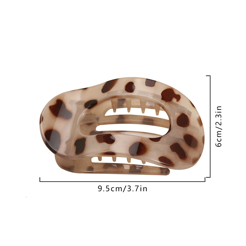 Injected plastic hair claw clip in the shape of a duckbill